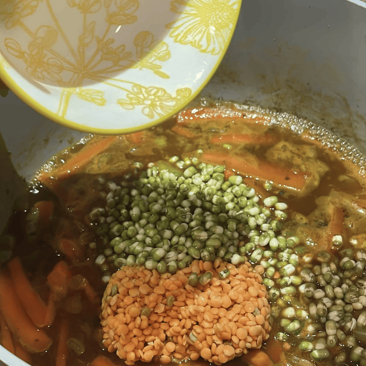 simmer the dal and lentils in the pot