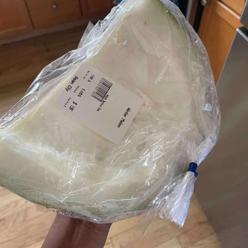 Fresh Ash Gourd just bought in a transparent plastic bag